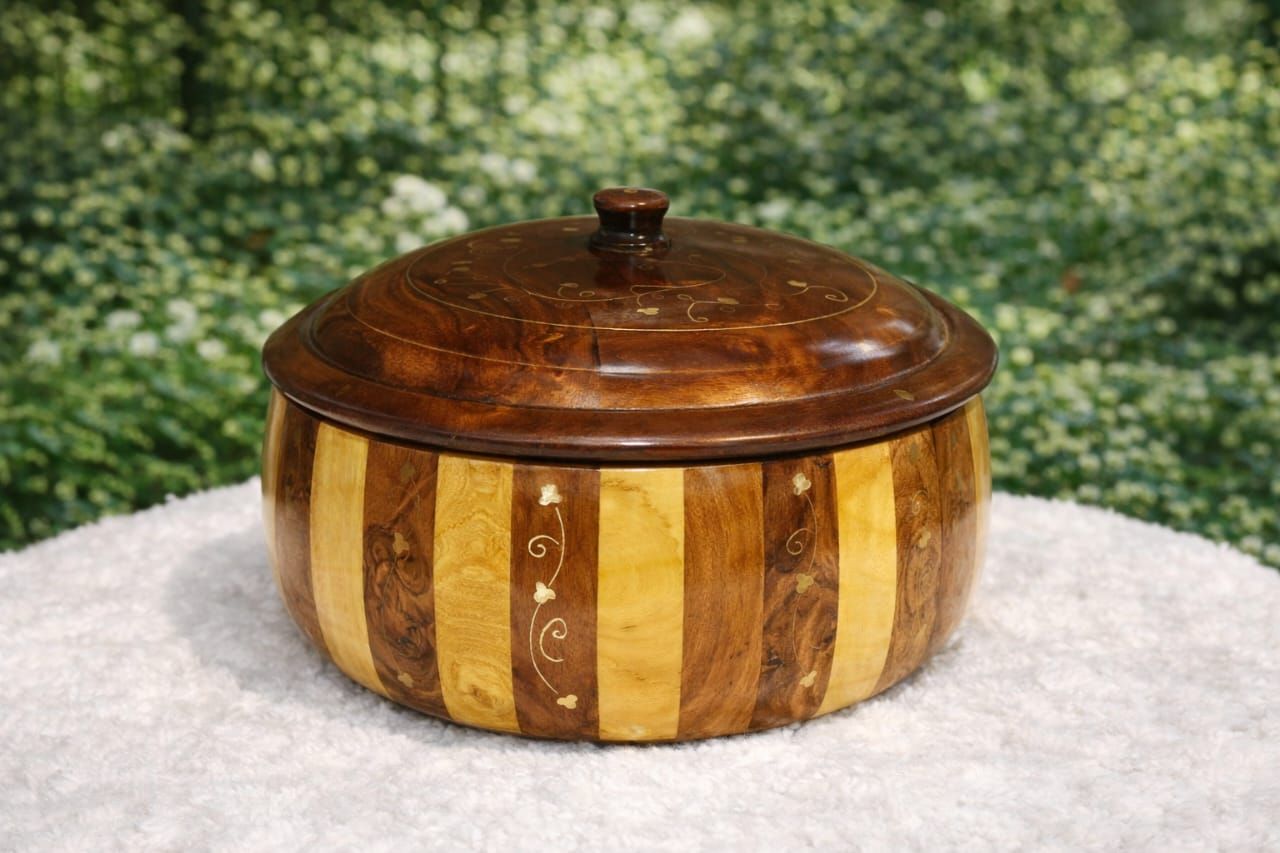 Solid wood watermelon shaped hot pot featuring brass inlay detailing – Chinioti Handcrafts